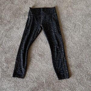 Vuori black/grey green leopard leggings.